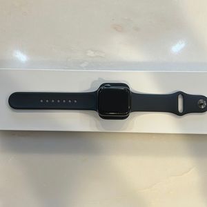 Apple Watch SE first generation. Used. Excellent condition. Black with navy band